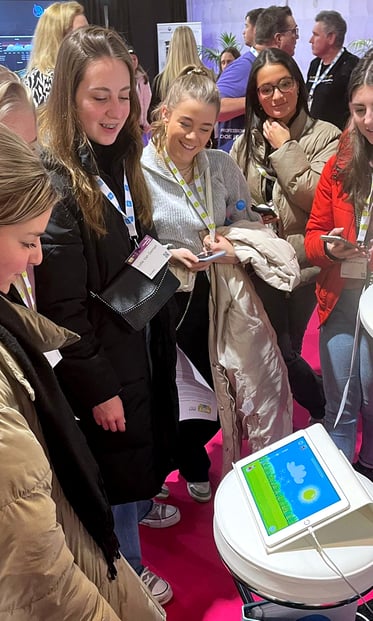 Teacher students playing a game on a tablet