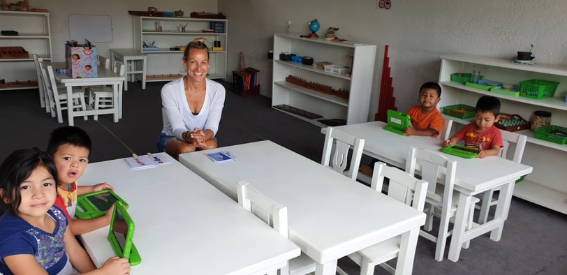 Romy in a schoolroom with Guatemalan children