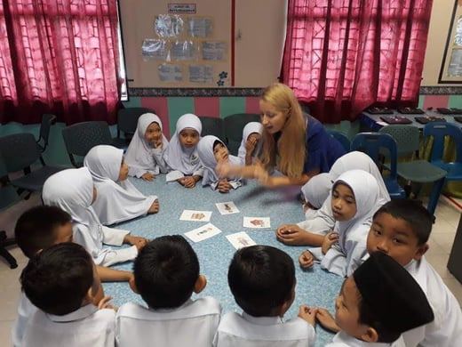 Our teacher Inka holding the first playful lesson on the topic of family.