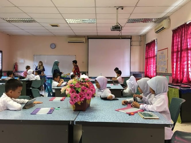 Malaysian children using the Moomin Language School learning application