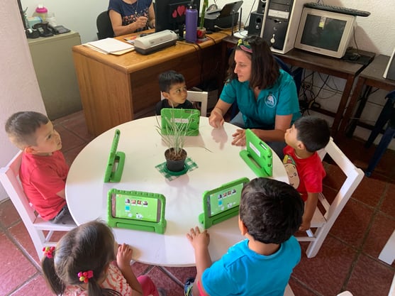 Teacher and children using MoominLS in Guatemala