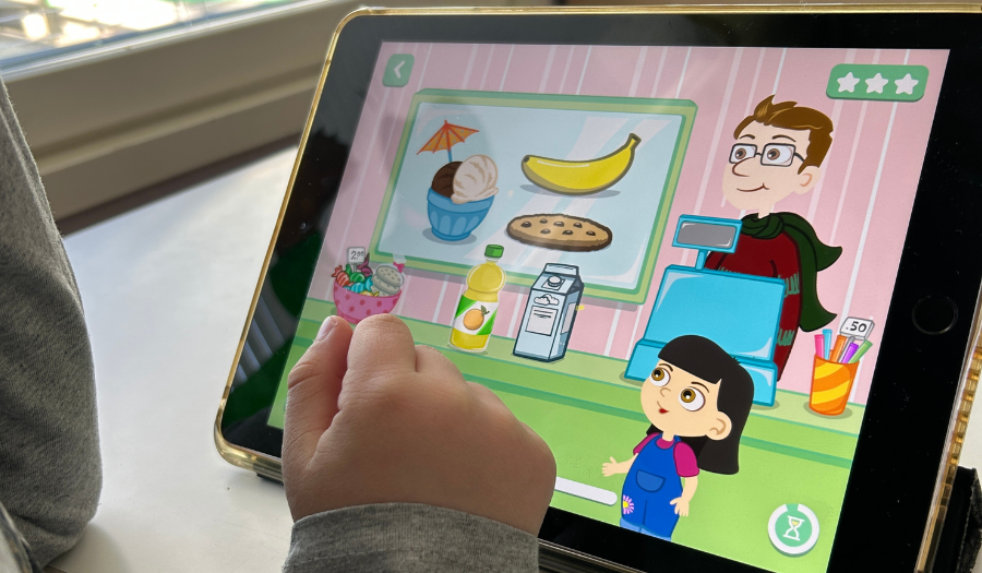 A child at Norlandia Apila using the Moomin Language School learning application